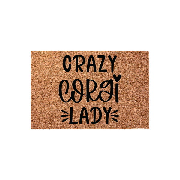 Crazy Corgi Lady coir doormat featuring bold black text printed on a natural brown fiber background, making a fun and welcoming entrance decor piece for any dog lover who enjoys a humorous touch at their front door.