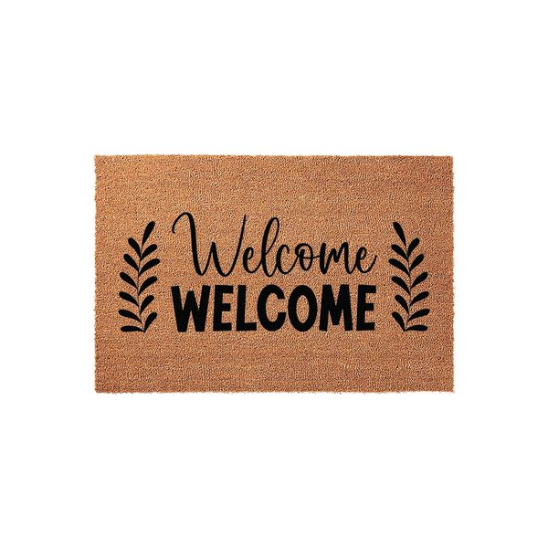 Natural coir welcome doormat featuring a double welcome design with elegant script and bold block lettering, flanked by simple black leaf sprigs on a textured brown fiber background for a classic farmhouse entryway decor style.