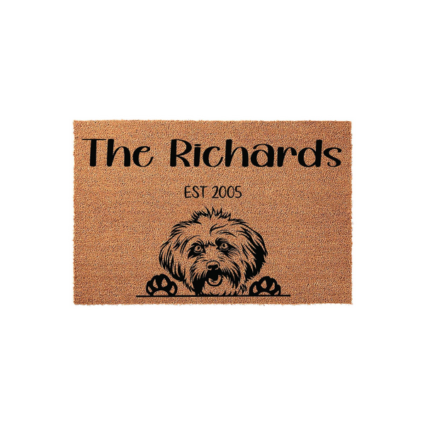 Personalized Havanese Dog Doormat featuring a cute illustrated Havanese puppy peeking over the bottom edge, customized with a family name and established year on a natural coir fiber mat against a clean white studio background.