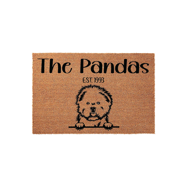 Personalized Bichon Frise doormat featuring a cute illustrated dog peeking over a line, with custom family name text and established year printed in black on a natural brown coir fiber mat for a welcoming home entrance.