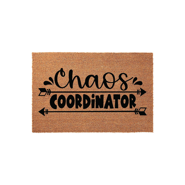 Chaos Coordinator natural coir doormat featuring bold black typography and decorative arrow accents, set against a clean white background to showcase the textured fiber surface of this humorous front porch welcome mat for any