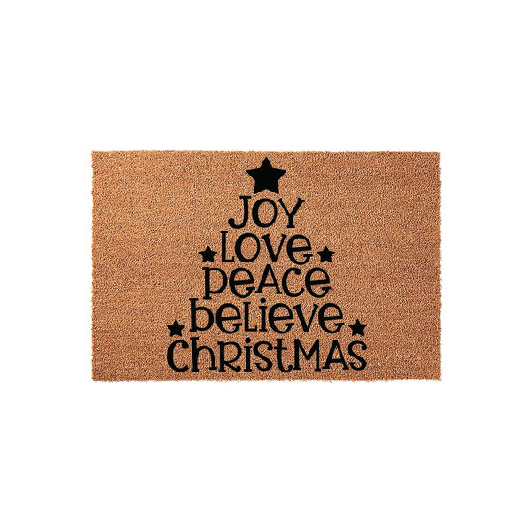 Christmas Tree Holiday Doormat featuring a natural coir texture with black printed text that reads Joy, Love, Peace, Believe, and Christmas arranged in a festive tree shape with star accents on a plain white studio background.