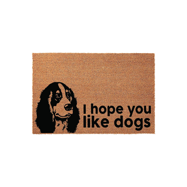 Cocker Spaniel I Hope You Like Dogs doormat featuring a black and tan dog illustration printed on a natural coir fiber mat, creating a fun and welcoming entryway decor piece for any dog lover's home on a plain white background.