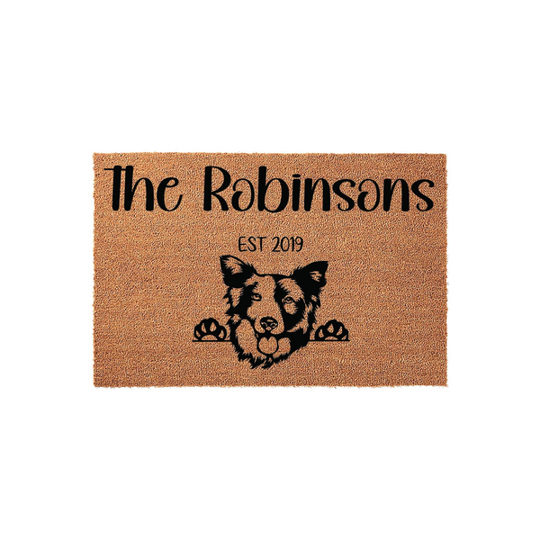 Personalized Border Collie doormat featuring a cute dog peeking over the edge with its paws, printed on a natural coir fiber mat with a family name and established year for a welcoming home entrance decor piece that pet lovers