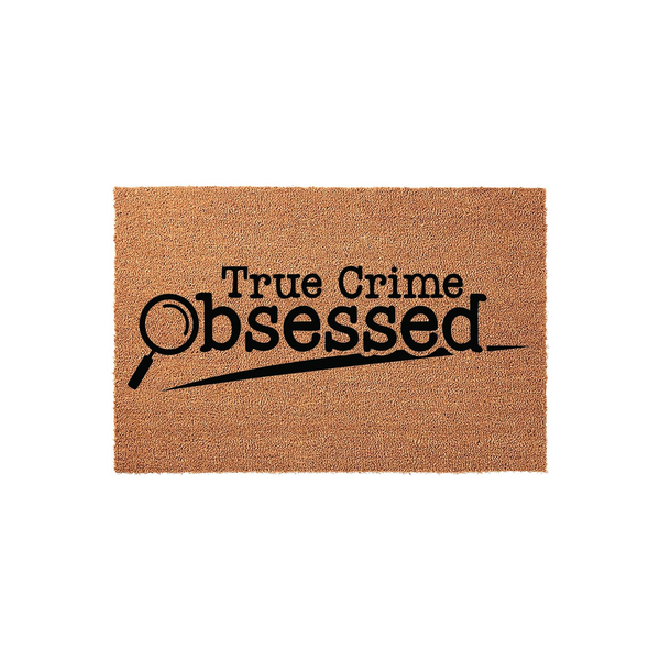 True Crime Obsessed coir doormat featuring a natural brown fiber texture and bold black text with a magnifying glass graphic, making it a fun front porch decor choice for fans of mystery and true crime podcasts and documentaries.