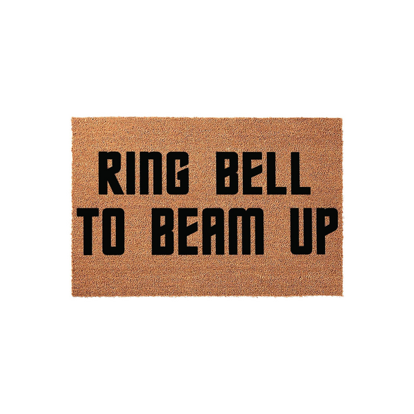 Ring Bell To Beam Up funny doormat featuring bold black text on a natural tan coir fiber background, designed for sci-fi fans who want a humorous welcome mat for their front porch or entryway to greet guests with a space-themed