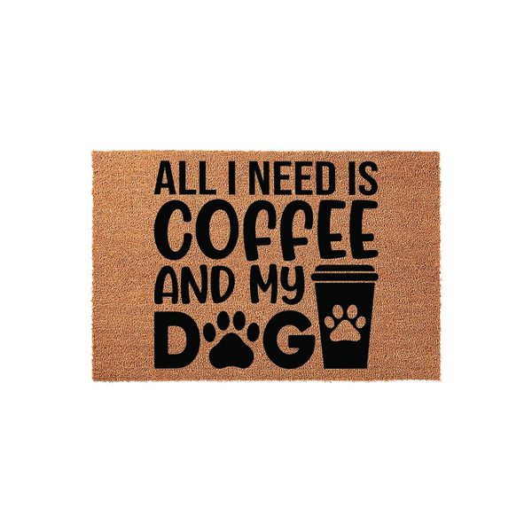 Coffee and Dog Lover Coir Doormat featuring the text All I Need Is Coffee And My Dog with a paw print replacing the letter O and a coffee cup icon, set against a natural tan textured fiber background for a rustic home entryway