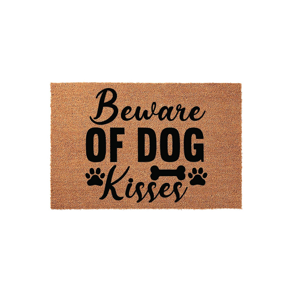 Beware of Dog Kisses coir doormat featuring a natural brown fiber texture with bold black text and cute paw print and bone graphics, making it a fun and welcoming entryway rug for any pet lover's home front porch or indoor