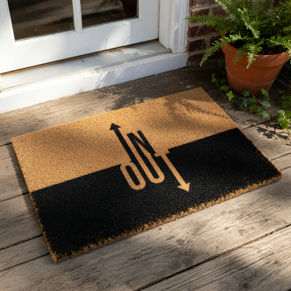 In Out doormat with a modern two-tone design featuring a natural coir top half and a black bottom half, this funny front door mat serves as a stylish welcome mat for your home entrance, porch, or entryway decor with bold