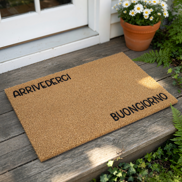 Natural coir doormat with black text reading Buongiorno and Arrivederci, this durable fiber welcome mat is a stylish front porch decor piece for your home entrance, perfect as a functional outdoor floor mat for guests and