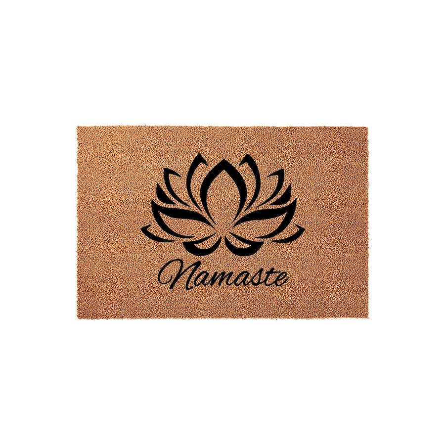 Namaste lotus flower coir doormat featuring a natural brown fiber texture with a bold black graphic of a blooming lotus and the word Namaste in a cursive script, creating a welcoming entryway accent for any yoga or meditation
