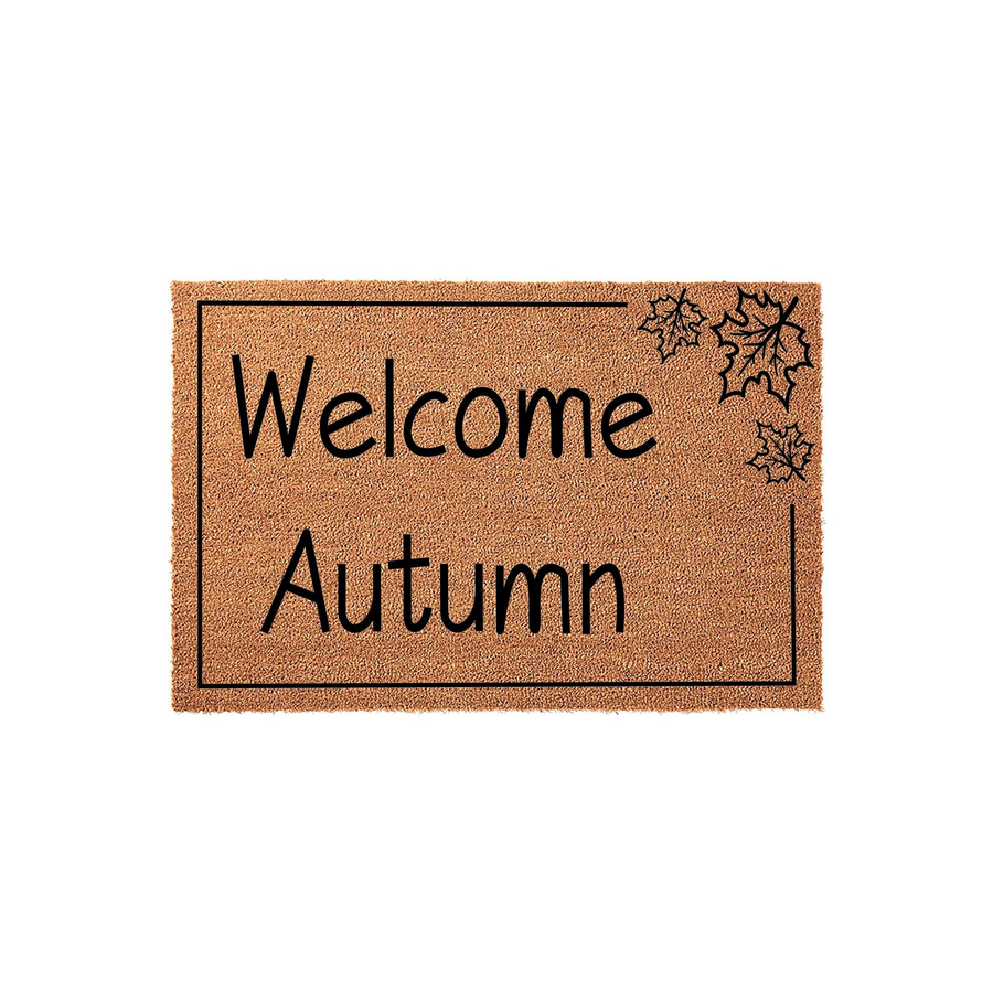 Autumn Welcome Doormat featuring a natural coir texture with black text that reads Welcome Autumn, accented by a simple line border and decorative leaf illustrations in the top right corner against a clean white studio background.