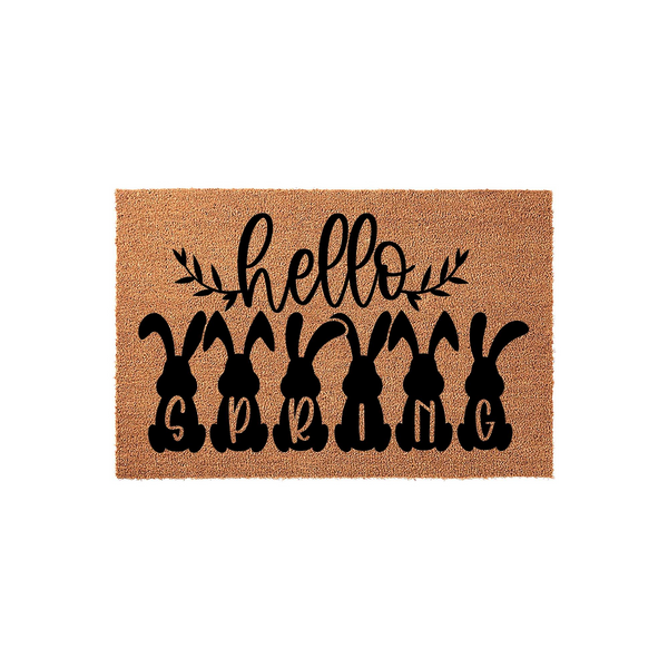 Hello Spring Easter Bunny Doormat featuring a natural coir texture with black printed silhouettes of six bunnies, each containing a letter that spells out the word SPRING beneath the script text hello on a clean white background.