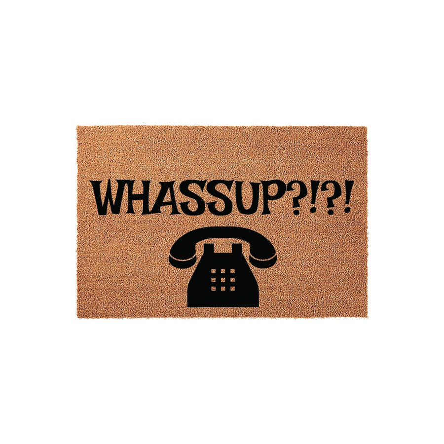 Funny Whassup Doormat featuring a retro rotary telephone graphic printed in black on a natural tan coir fiber mat, creating a humorous and nostalgic welcome for guests arriving at your front door with this unique home decor piece.