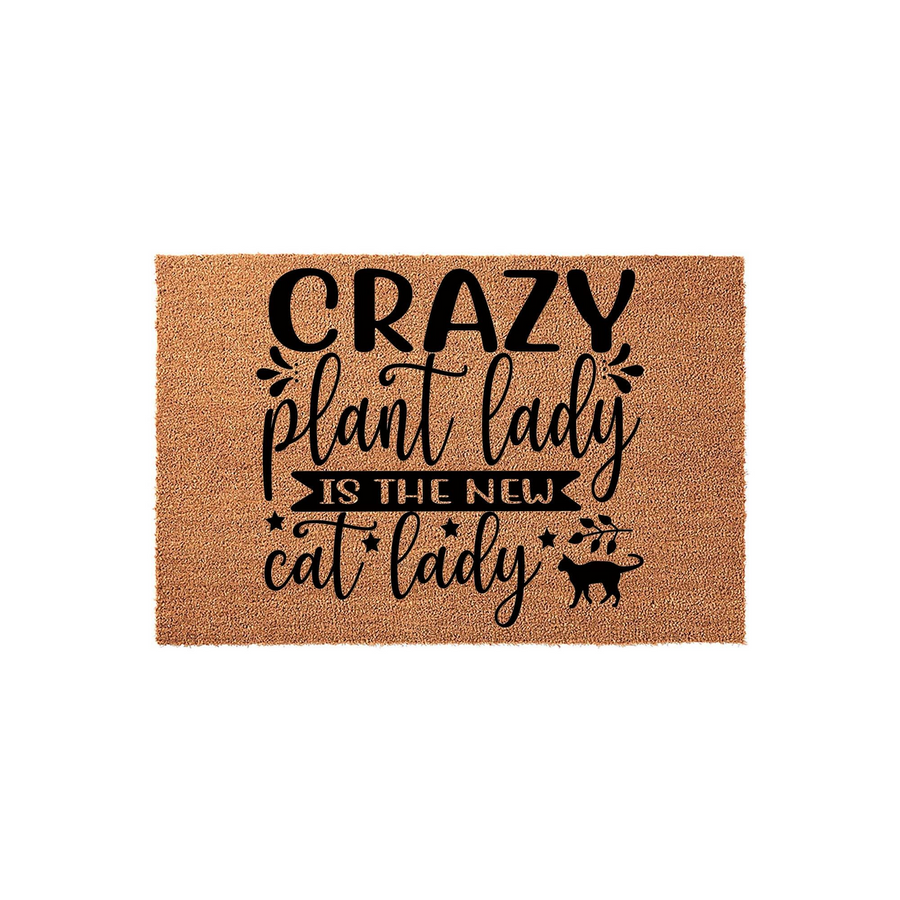 Crazy Plant Lady Is The New Cat Lady coir doormat featuring bold black typography and a cute cat silhouette, perfect for a front porch entrance to show off your love for indoor plants and feline friends in a fun, welcoming style.