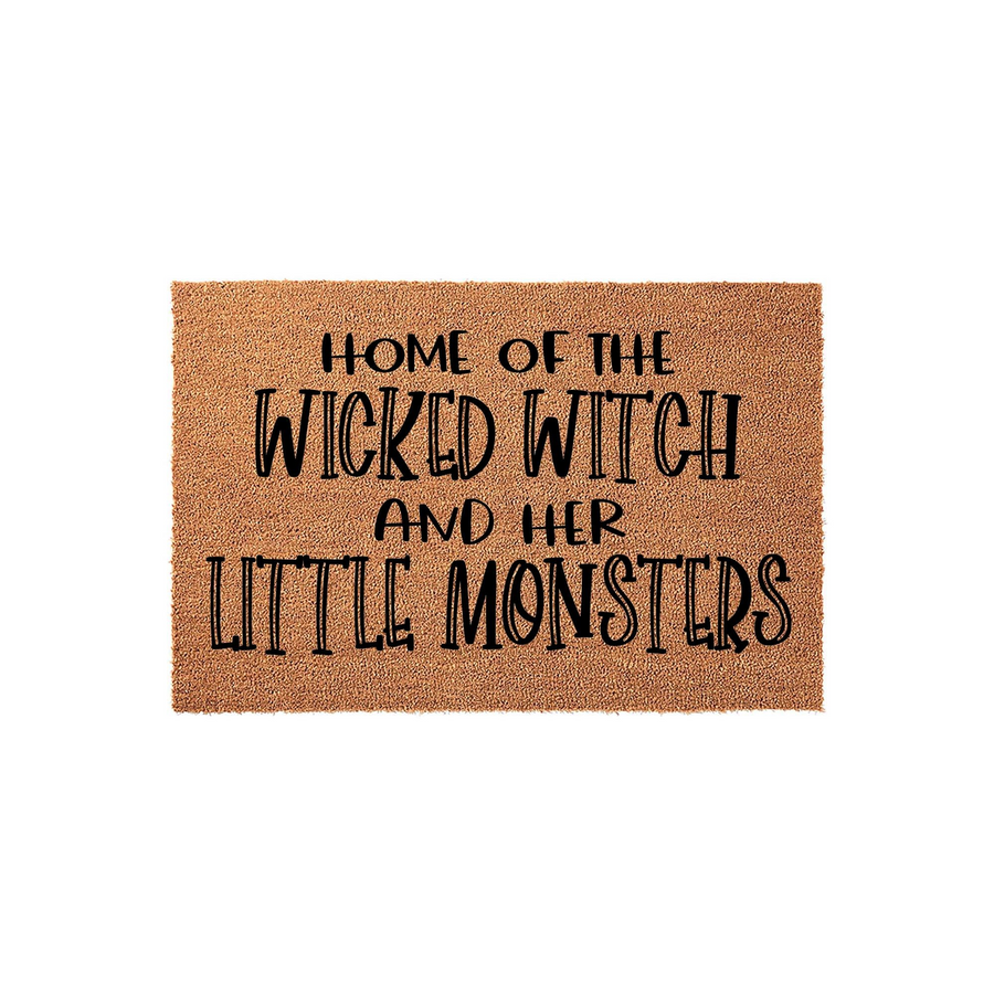 Wicked Witch Halloween Doormat featuring natural coir fibers and bold black text that reads Home of the Wicked Witch and her Little Monsters, creating a fun and spooky entryway decoration for the fall season on a plain white