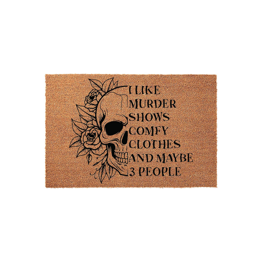 Funny Skull and Rose Coir Doormat featuring a black graphic of a human skull surrounded by floral roses, with text that reads I Like Murder Shows Comfy Clothes and Maybe 3 People, set against a natural brown textured coir