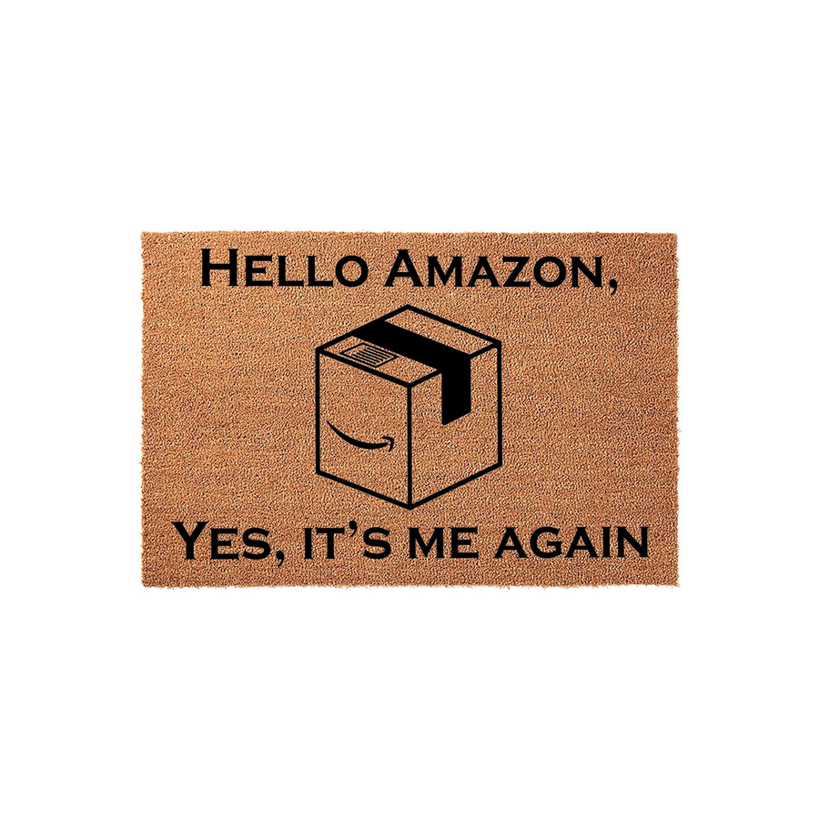 Funny Amazon delivery doormat featuring a natural coir texture with black text that reads Hello Amazon, Yes, It Is Me Again, centered above and below a graphic illustration of a cardboard shipping box on a clean white background.