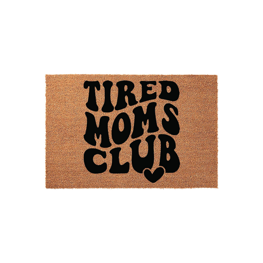 Tired Moms Club coir doormat featuring bold, wavy black lettering centered on a natural tan fiber background, creating a fun and relatable entryway decor piece for any home that celebrates the busy life of a modern mom.
