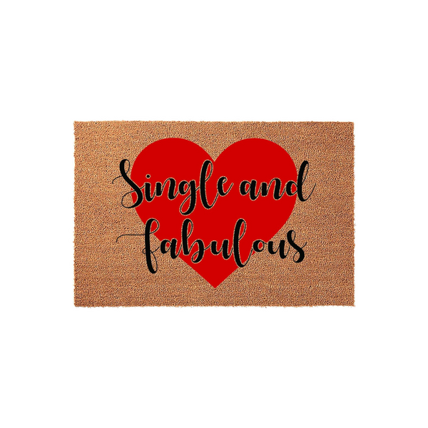 Single and Fabulous coir doormat featuring a large, bold red heart printed in the center of the natural brown fiber mat, with the text written in a stylish black cursive font against a clean, plain white studio background.