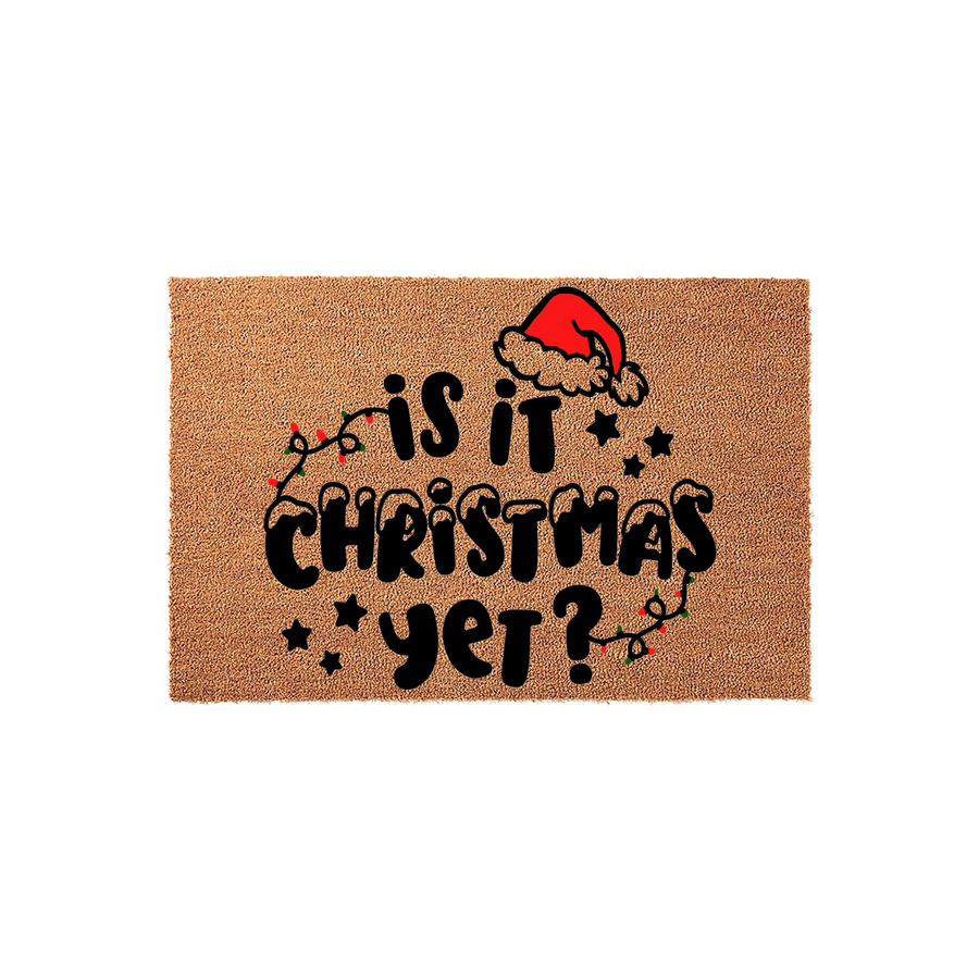 Is It Christmas Yet Coir Doormat featuring a festive red Santa hat and colorful string lights on a natural brown fiber background, making a fun holiday entryway decoration for your front porch during the winter season.