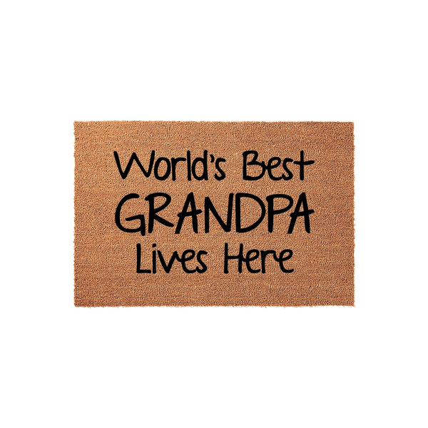 World's Best Grandpa Lives Here coir doormat featuring bold black text printed on a natural brown fiber surface, presented against a clean white background to highlight the celebratory message for a beloved family member.