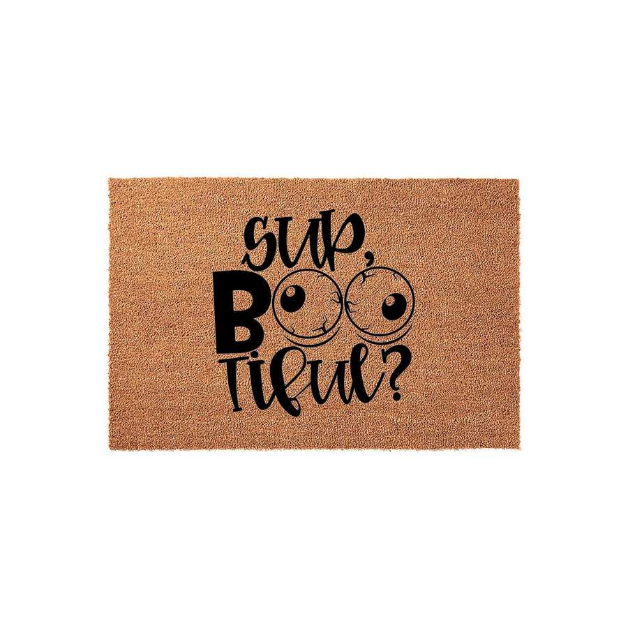Funny Halloween Coir Doormat featuring the text Sup, Boo-tiful? in bold black lettering with two cartoon eyeballs replacing the double O, set against a natural tan textured coir background for a festive seasonal entryway