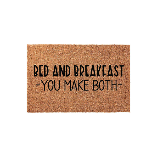 Funny Bed and Breakfast You Make Both coir doormat featuring bold black text printed on a natural brown fiber mat, displayed against a clean white background to highlight the humorous message for a home entryway or front porch