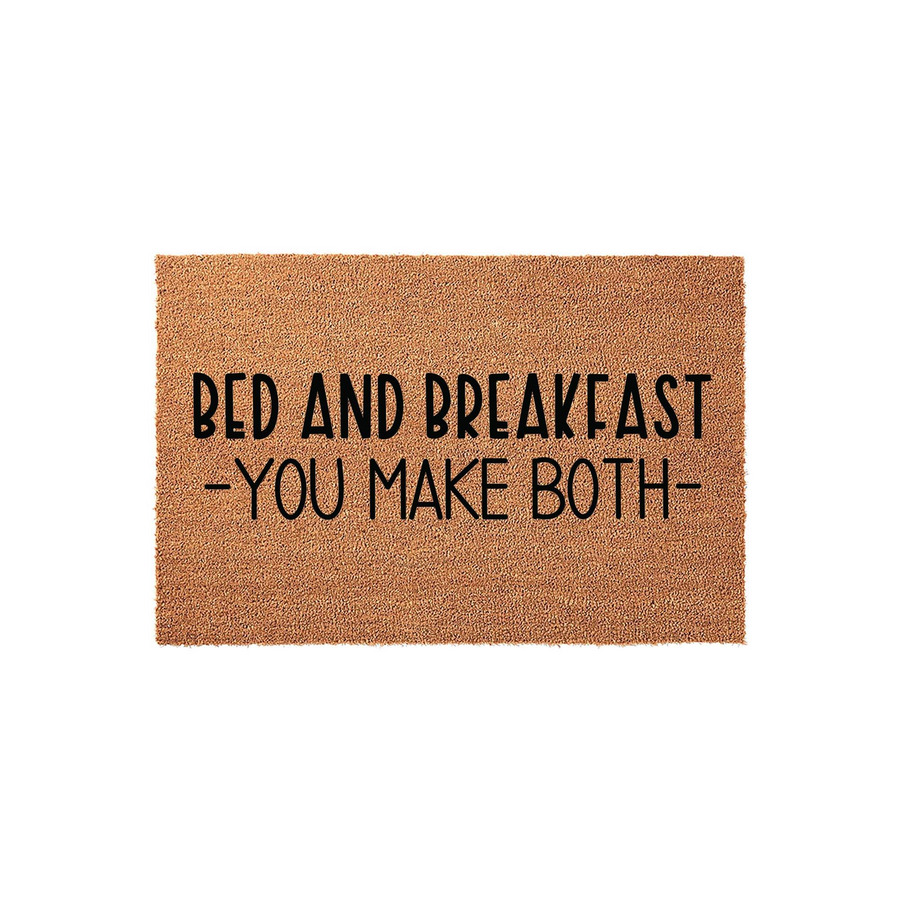 Funny Bed and Breakfast You Make Both coir doormat featuring bold black text printed on a natural brown fiber mat, displayed against a clean white background to highlight the humorous message for a home entryway or front porch
