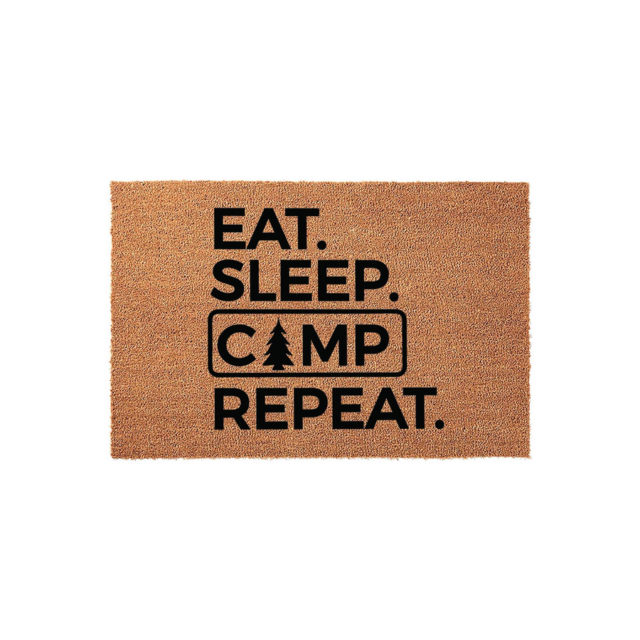 Eat Sleep Camp Repeat coir doormat featuring bold black text on a natural tan fiber background, with a pine tree icon replacing the letter A in the word camp to create a fun outdoor camping theme for your front porch or camper