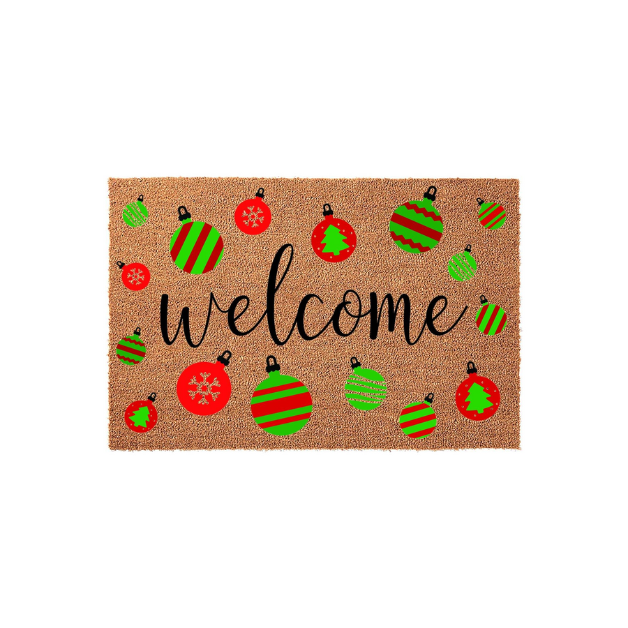 Christmas Welcome Doormat featuring a natural coir texture decorated with festive red and green ornaments in various patterns, centered with elegant black cursive text that greets guests for the holiday season.