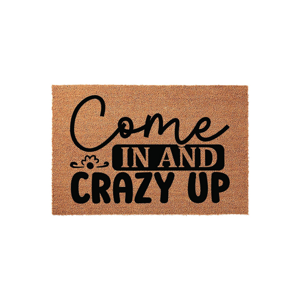 Come In And Crazy Up doormat featuring a natural coir texture with bold black typography that adds a humorous and welcoming touch to any front porch entryway, showcasing a playful design that is sure to make guests smile upon