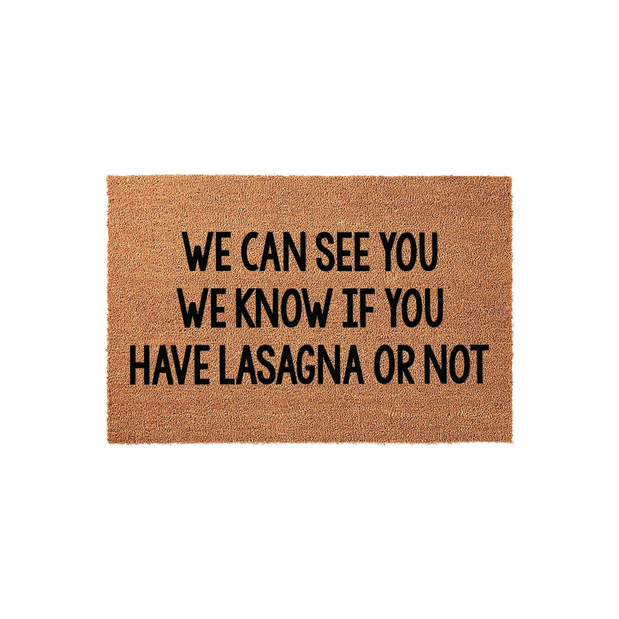 Funny Lasagna Welcome Doormat featuring a natural coir texture with bold black text that reads We Can See You We Know If You Have Lasagna Or Not, making it a humorous and welcoming addition to any front porch or entryway decor.