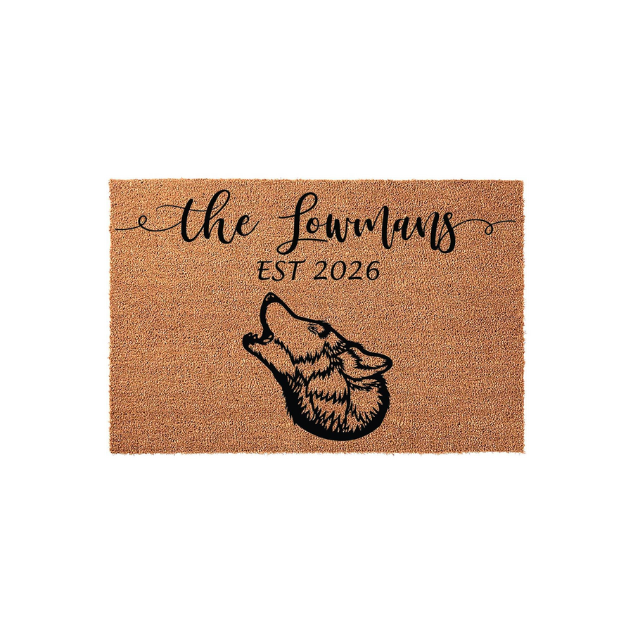Personalized wolf family doormat featuring a howling wolf illustration and custom family name text on a natural coir fiber background, creating a rustic and welcoming entrance decor piece for any home with a love for wildlife