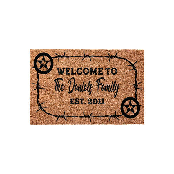 Personalized Texas star doormat featuring a rustic barbed wire border design on natural coir fiber, displaying the text Welcome To The Family with an established year on a clean white background for a farmhouse entryway decor
