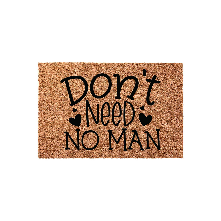 Funny Don't Need No Man coir doormat featuring bold black typography and decorative heart accents on a natural brown fiber background, creating a sassy and welcoming entrance piece for a modern home or apartment front porch
