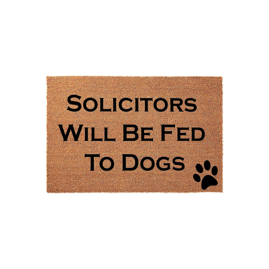 Funny Solicitors Will Be Fed To Dogs doormat featuring bold black text and a paw print design on a natural coir fiber mat, perfect for a dog lover's front porch entrance to keep unwanted visitors away with a humorous warning