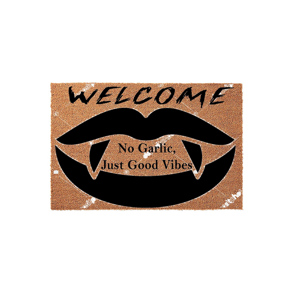 Funny Vampire Welcome Doormat featuring a black graphic of lips with sharp fangs and the text No Garlic, Just Good Vibes printed on a natural tan coir fiber mat, perfect for a spooky Halloween entryway or a gothic home decor