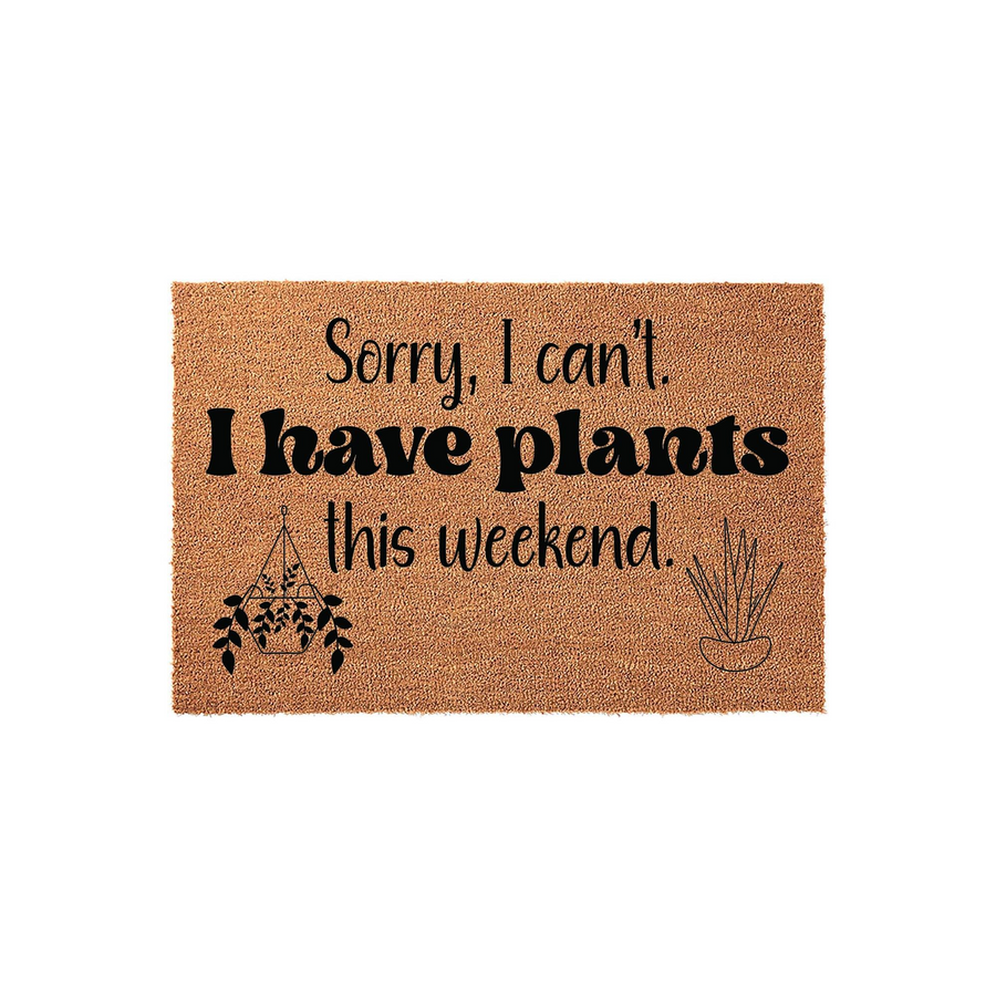 Sorry I Can't I Have Plants This Weekend doormat featuring a natural coir texture with black text and illustrations of a hanging planter and a potted succulent, perfect for a plant lover's home entrance or a fun outdoor porch