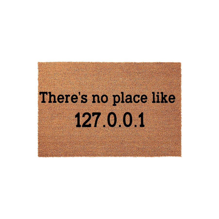Funny Computer Programmer Doormat featuring the text There is no place like 127.0.0.1 printed in bold black letters on a natural tan coir fiber mat, perfect for a tech enthusiast home entrance or a unique geeky housewarming decor