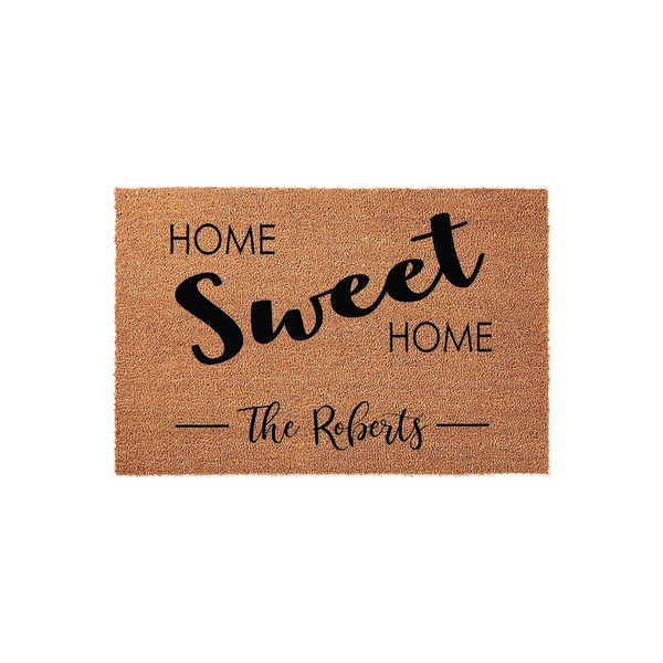 Personalized Home Sweet Home doormat featuring a natural coir texture with bold black lettering and a custom family name space, providing a welcoming and durable entrance decor piece for any front porch or entryway in a clean