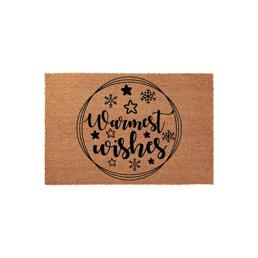 Warmest Wishes Christmas Coir Doormat featuring a circular design with black script text, snowflakes, and stars printed on a natural tan fiber background, creating a festive holiday welcome for your front porch entryway decor.
