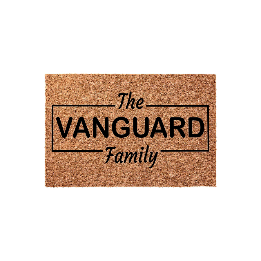 Personalized family name coir doormat featuring a rectangular border design with the text The Family centered in a clean, modern font, set against a plain white background for a classic and welcoming home entrance decor style.