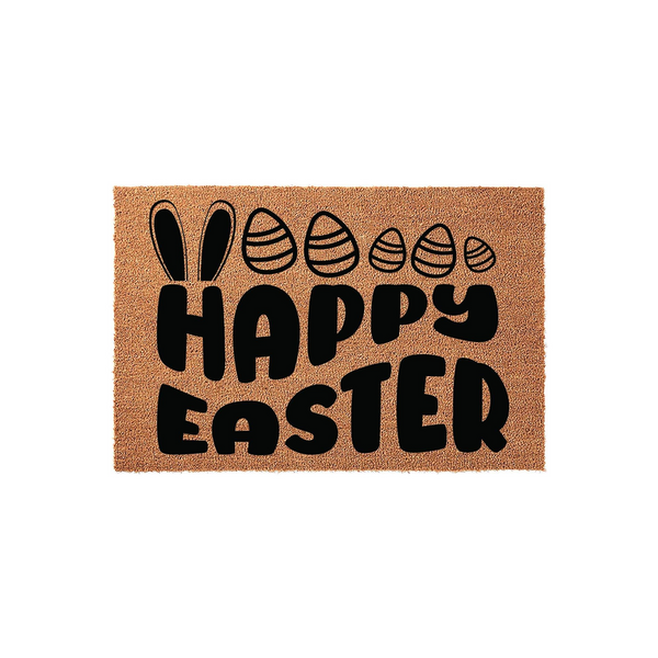 Happy Easter coir doormat featuring a festive design with black printed text and cute bunny ears peeking out from behind decorated eggs, set against a natural tan textured fiber background for a seasonal spring home entryway