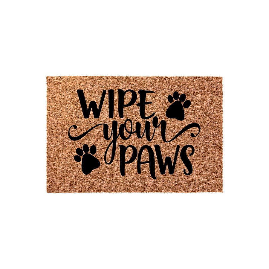 Wipe Your Paws coir doormat featuring a natural brown fiber texture and bold black lettering with decorative paw print icons, creating a fun and functional entryway rug for any pet lover's home decor on a clean white background.