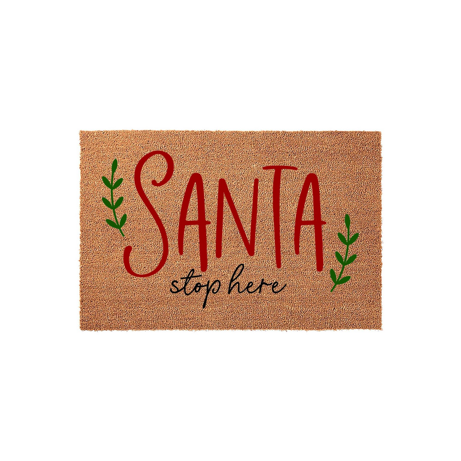 Santa Stop Here Christmas Doormat featuring festive red and black lettering on a natural coir fiber background, accented with simple green leaf sprigs to create a cheerful holiday entryway decoration for your front porch decor.