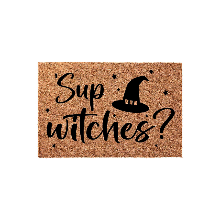 Sup Witches Halloween Doormat featuring a natural coir texture with black text and a witch hat graphic, creating a fun and spooky entryway decor piece that is ideal for welcoming guests during the fall season on your front porch.