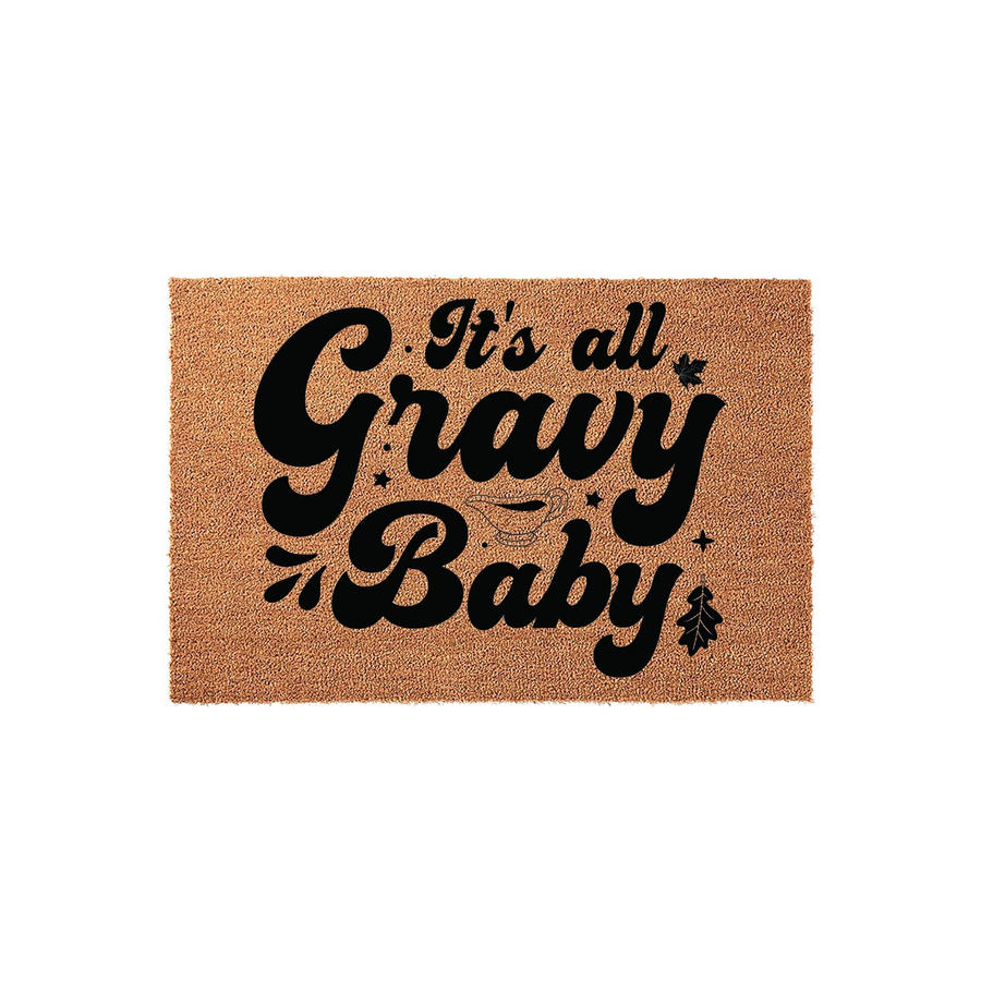 It's all Gravy Baby Thanksgiving coir doormat featuring bold black typography and a small gravy boat illustration on a natural tan fiber background, creating a festive and humorous entryway decor piece for the holiday season.