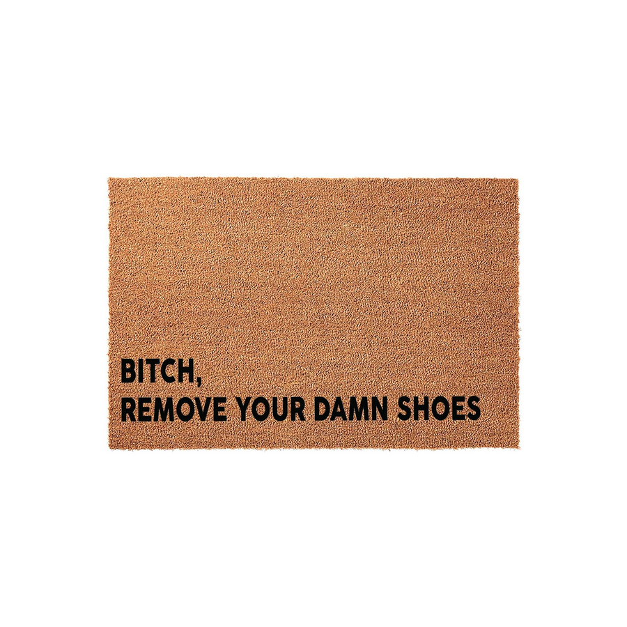 Funny Bitch Remove Your Damn Shoes doormat featuring a natural coir texture and bold black lettering, designed as a humorous entryway floor mat to keep your home clean and clearly communicate house rules to all your incoming