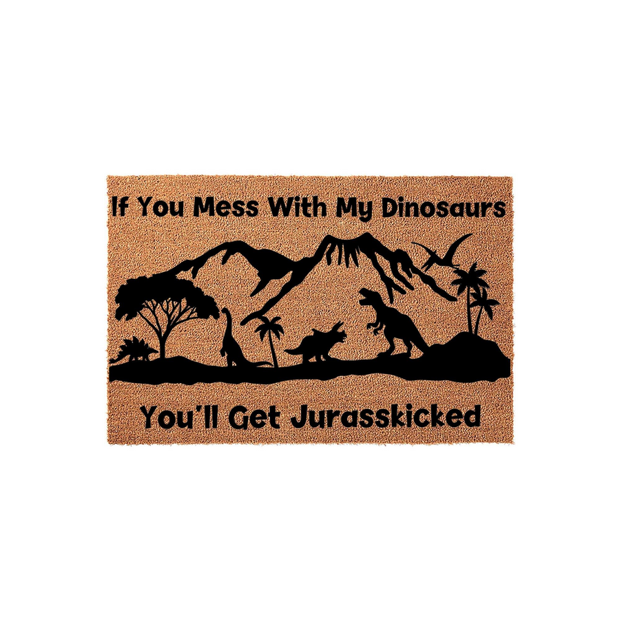 Dinosaur themed coir doormat featuring a black silhouette of a prehistoric landscape with volcanoes and various dinosaurs, accompanied by the humorous text If You Mess With My Dinosaurs You Will Get Jurasskicked on a natural